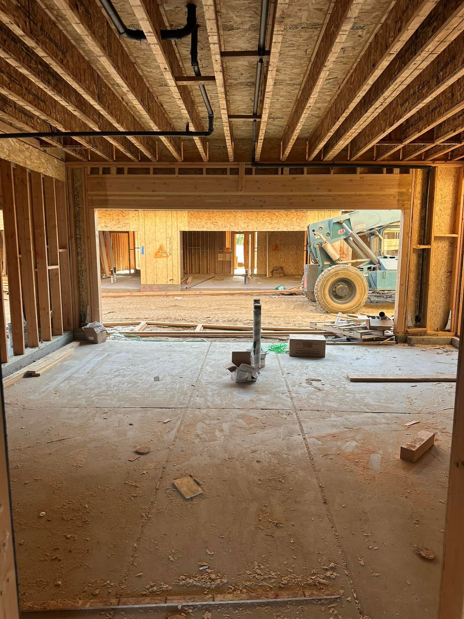Ontario Ranch new construction home during framing for Tyir Heywood's buyer client